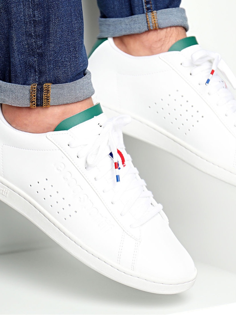 Le Coq Sportif White Sneakers with Green Heel Tab and Tricolor Lace Detail